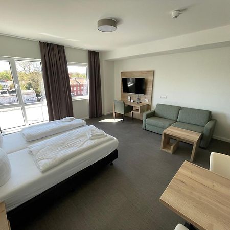 Hotel Am Pferdemarkt Aurich Bagian luar foto