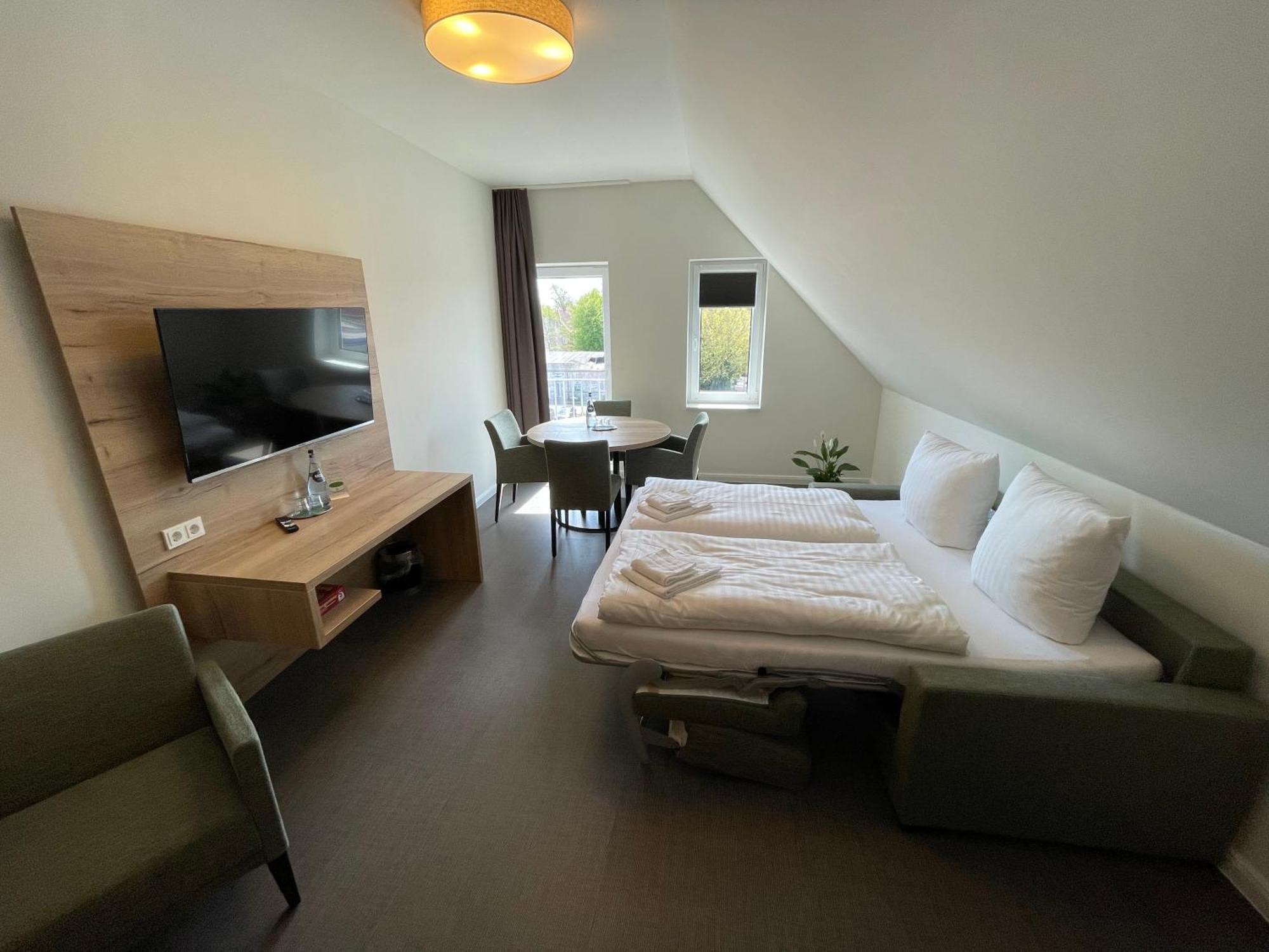Hotel Am Pferdemarkt Aurich Bagian luar foto