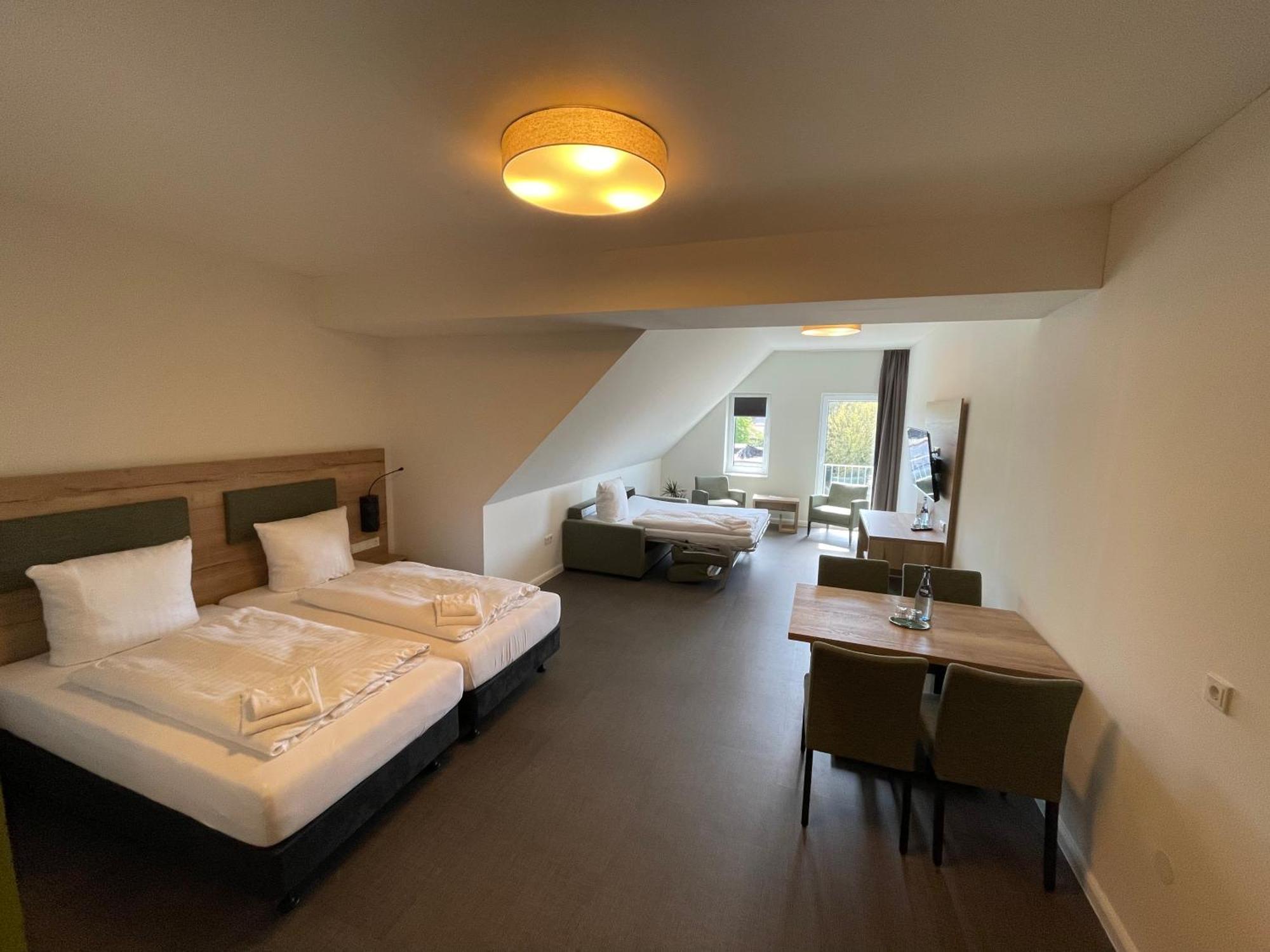 Hotel Am Pferdemarkt Aurich Bagian luar foto