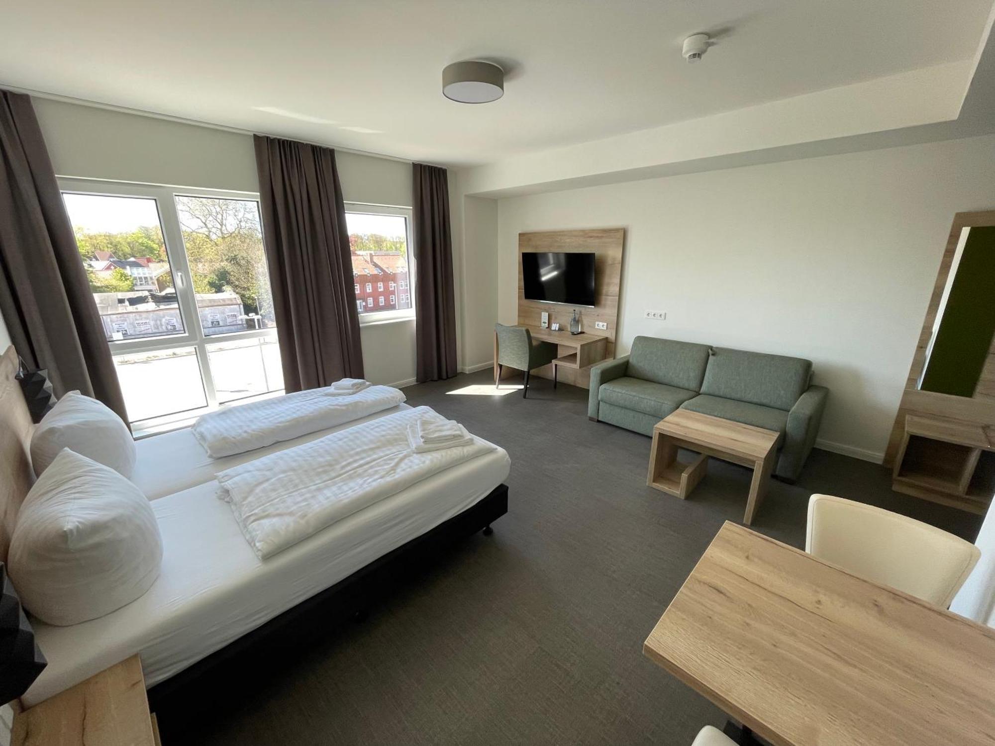 Hotel Am Pferdemarkt Aurich Bagian luar foto